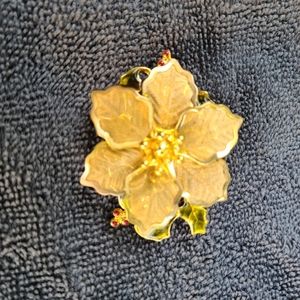 Vintage Brooch - flower with a second layer that has 3 sets of red berries.